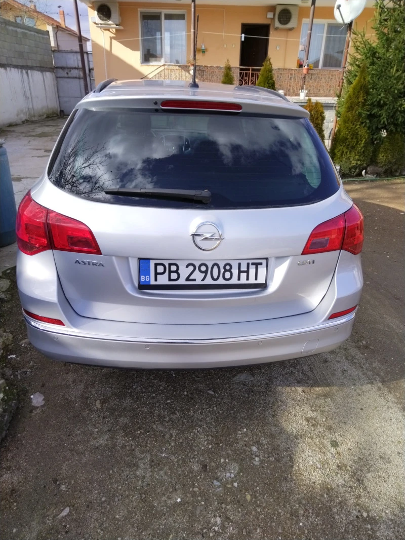 Opel Astra 1.6 diesel 110кс., снимка 14 - Автомобили и джипове - 47252462