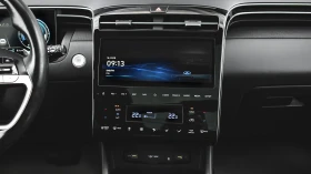Hyundai Tucson 1.6 T-GDi PREMIUM Plug-in Hybrid 4x4 Automatic - 62900 лв. / 32160.26 € - 19903512 10