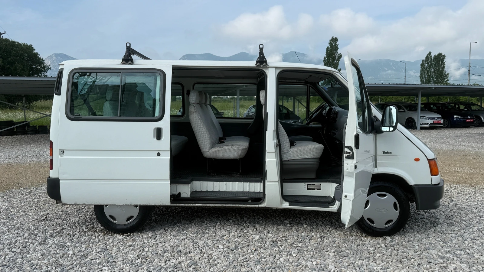 Ford Transit 2.5TD-84кс/КЛИМАТИК/9места/ВНОС ОТ ИТАЛИЯ, снимка 7 - Бусове и автобуси - 54798316