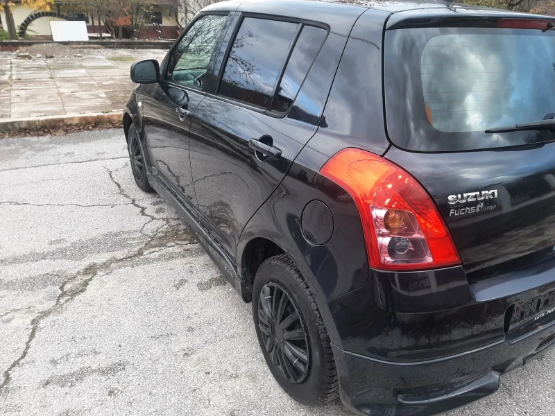 Suzuki Swift 1.3i KLIMA 4x4 FEIS, снимка 4 - Автомобили и джипове - 53388156