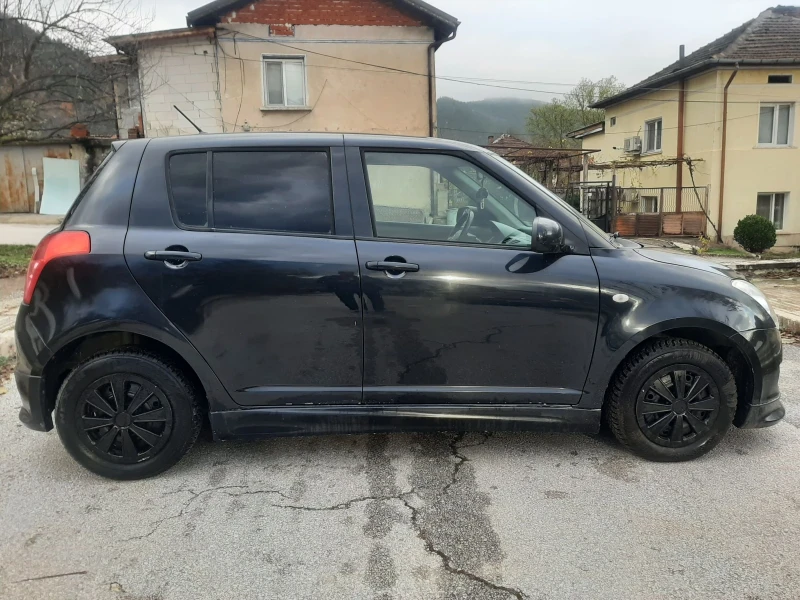 Suzuki Swift 1.3i KLIMA 4x4 FEIS, снимка 8 - Автомобили и джипове - 53388156