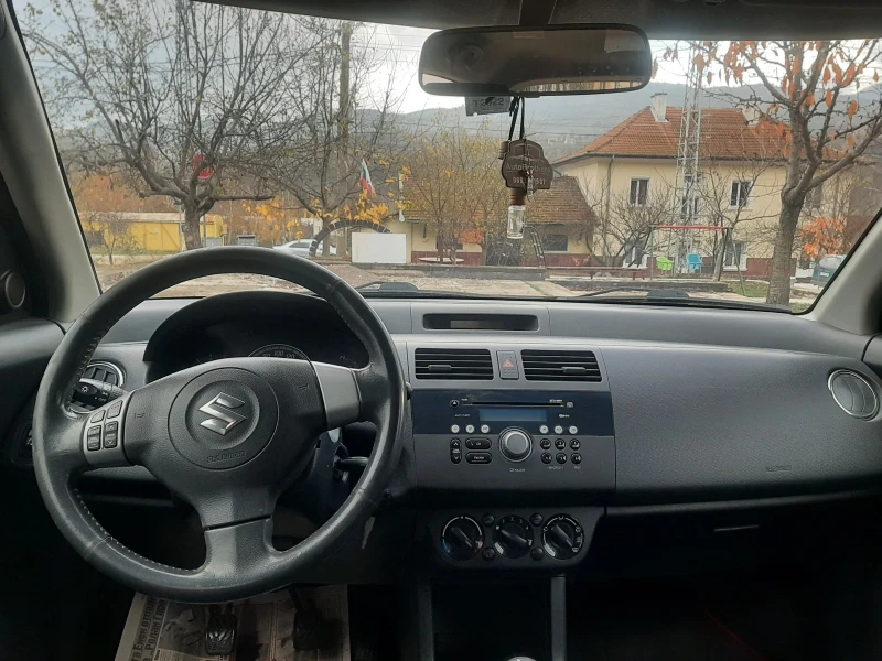 Suzuki Swift 1.3i KLIMA 4x4 FEIS, снимка 10 - Автомобили и джипове - 53388156