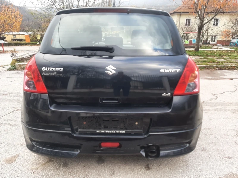 Suzuki Swift 1.3i KLIMA 4x4 FEIS, снимка 3 - Автомобили и джипове - 53388156