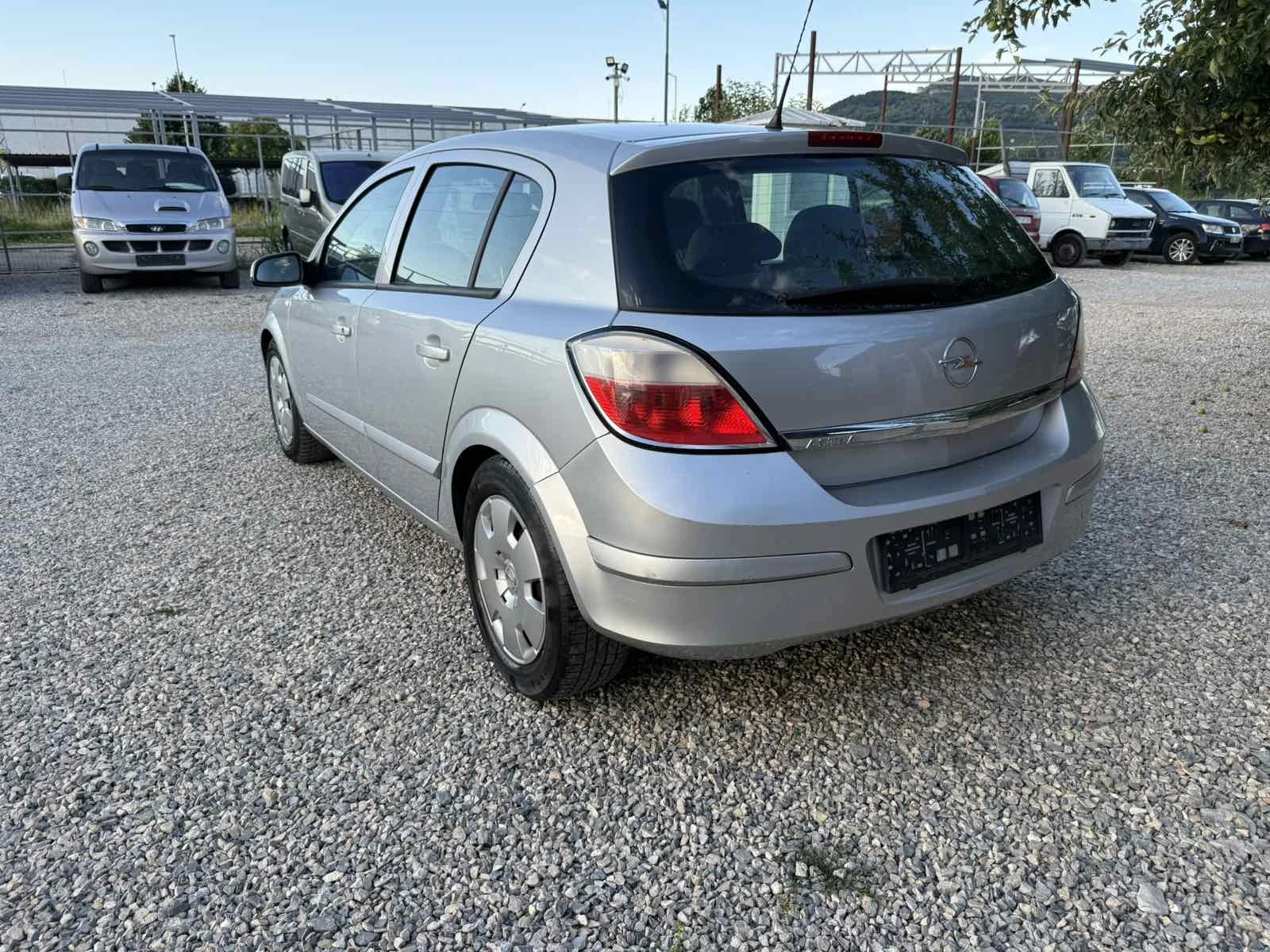 Opel Astra 1.4i 90kc, снимка 8 - Автомобили и джипове - 55260258