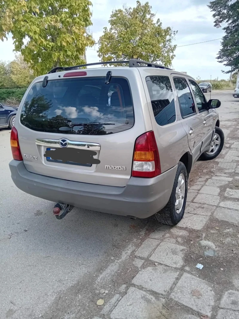 Mazda Tribute, снимка 4 - Автомобили и джипове - 47551519