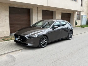 ������ Mazda 3