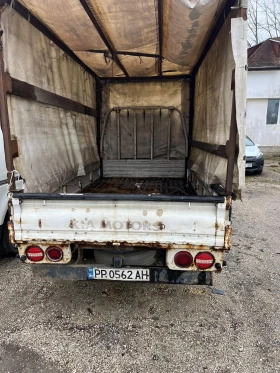 Kia Besta, снимка 5