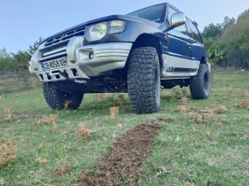 Обява за продажба на Mitsubishi Pajero ~17 500 лв. - изображение 4 | Auto.bg Обява за продажба на Mitsubishi Pajero ~17 500 лв. - изображение 4