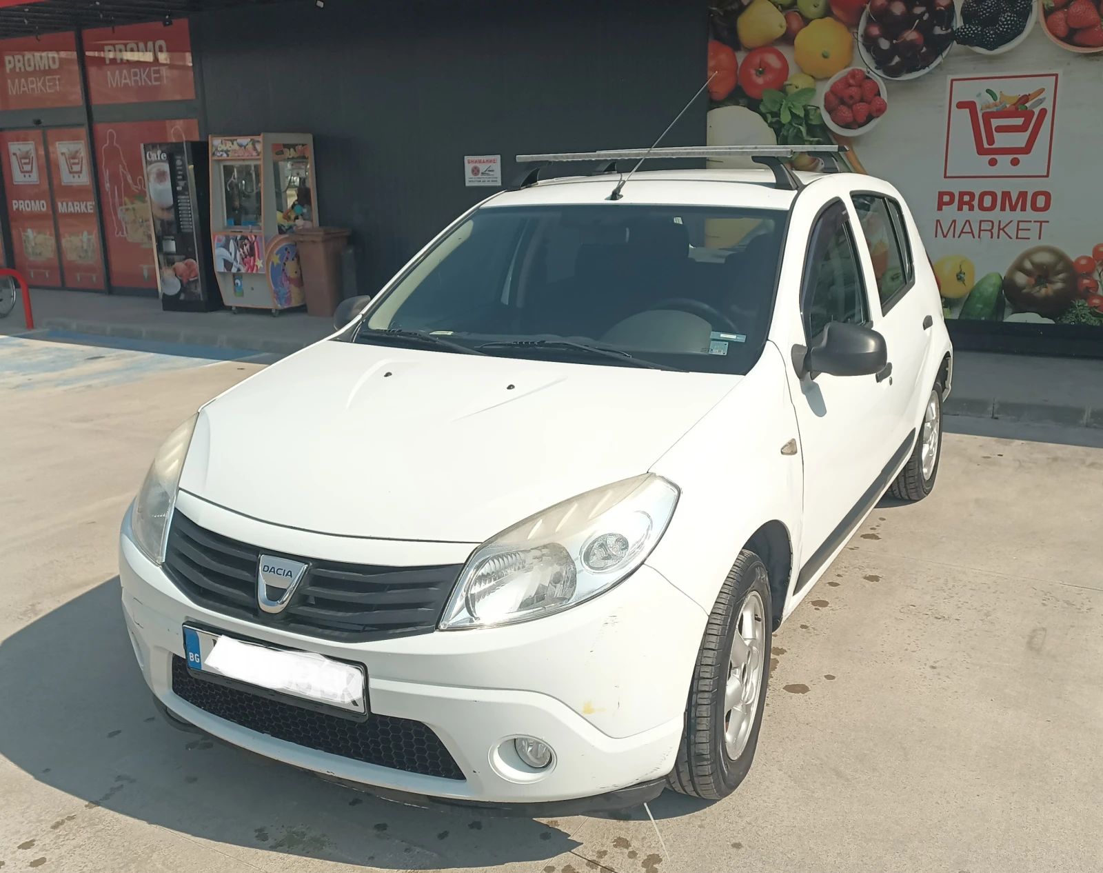 Dacia Sandero MPI, снимка 9 - Автомобили и джипове - 53749650