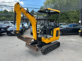 Багер JCB 16C1