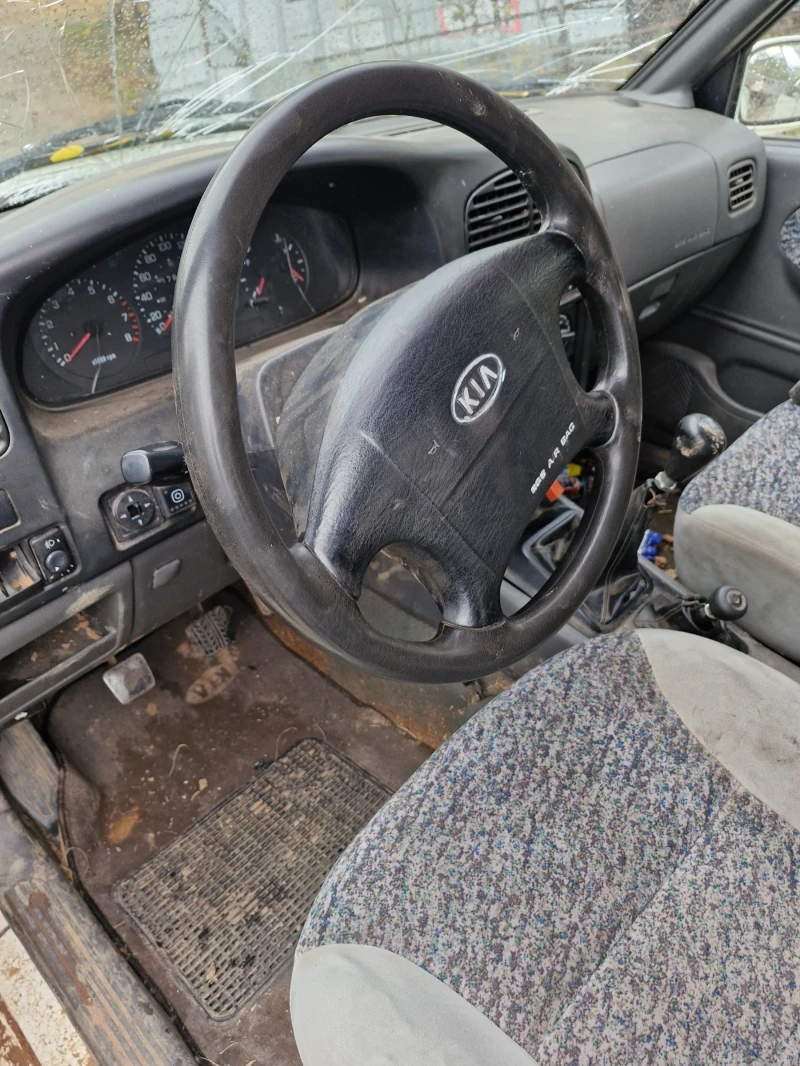 Kia Sportage 2.0 i, снимка 4 - Автомобили и джипове - 53331587