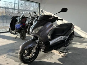     Yamaha Neos 4 . 