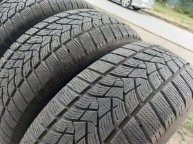 Гуми Зимни 235/65R17, снимка 2 - Гуми и джанти - 47266994