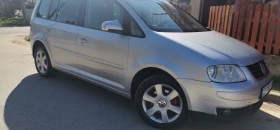 VW Touran 2.0 - изображение 1