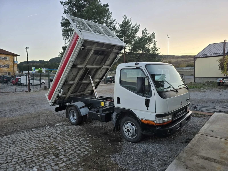 Mitsubishi Canter 3.0D * климатик* двойна гума* 3-странен самосвал* , снимка 13 - Камиони - 52256877