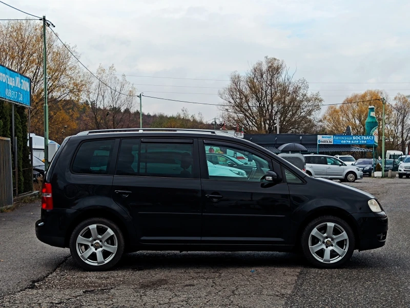 VW Touran 1.9 TDi* NAVI* КАМЕРА* ОБСЛУЖЕН* , снимка 4 - Автомобили и джипове - 52349988
