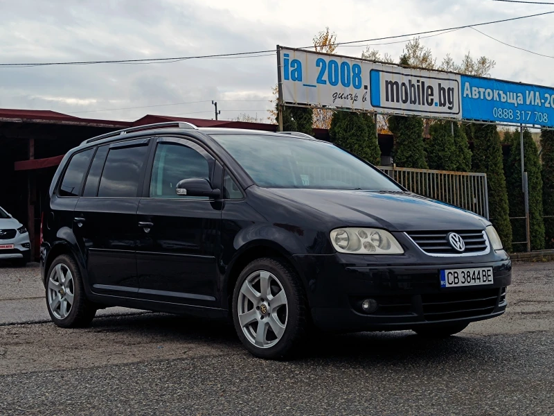 VW Touran 1.9 TDi* NAVI* КАМЕРА* ОБСЛУЖЕН* , снимка 3 - Автомобили и джипове - 52349988