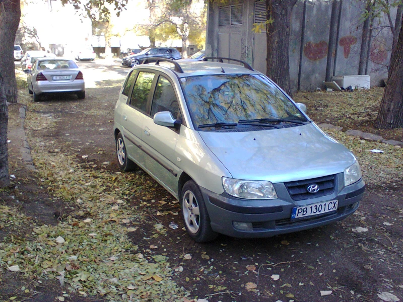 Hyundai Matrix 1.6 газ/безин Климатик - 90 коня, снимка 2 - Автомобили и джипове - 48144651