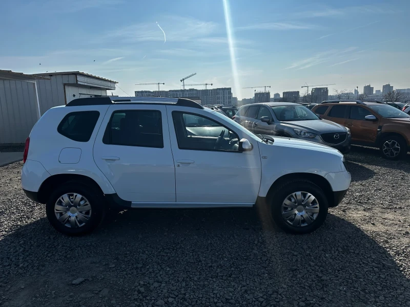 Dacia Duster 1.6 ШВЕЙЦАРИЯ 4х4, снимка 13 - Автомобили и джипове - 49139432