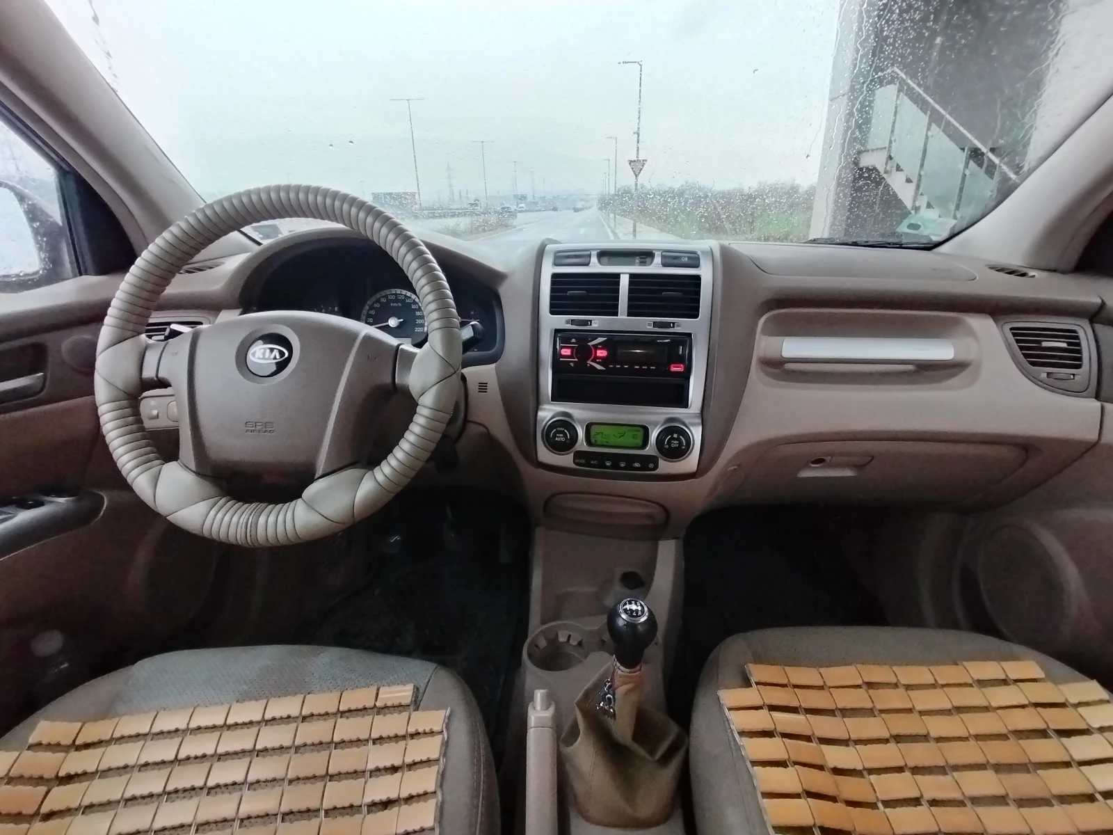 Kia Sportage 2.0 - изображение 7