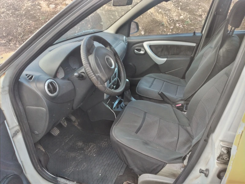 Dacia Logan комби, снимка 11 - Автомобили и джипове - 49087490