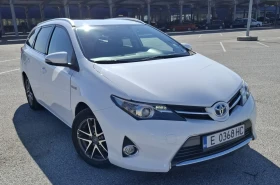 Обява за продажба на Toyota Auris 1.8 Hybrid ~17 000 лв. - изображение 1