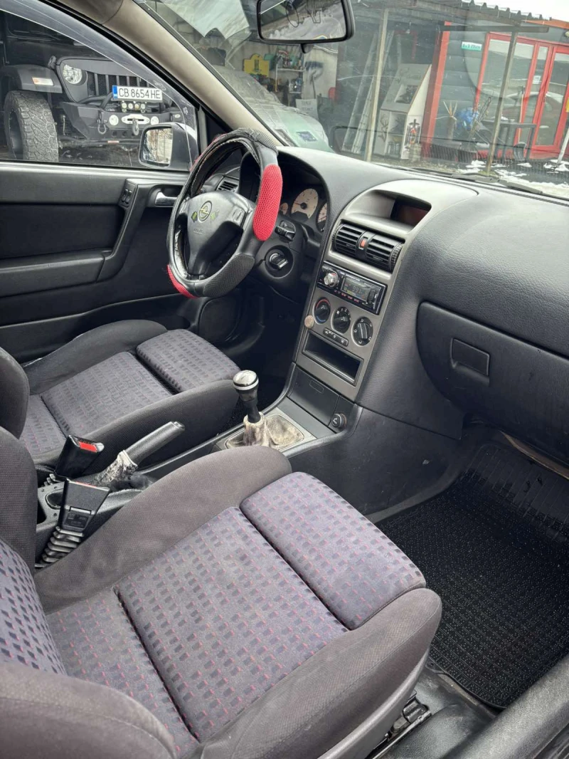 Opel Astra 2.0 D 100кс., снимка 8 - Автомобили и джипове - 48717661