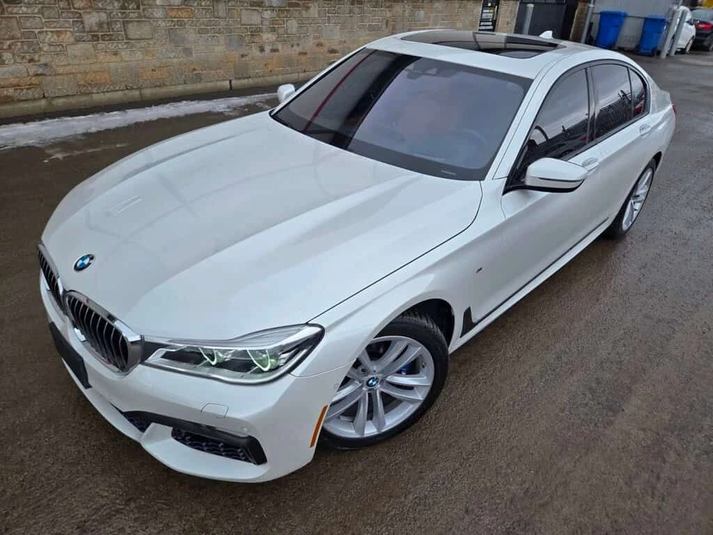 BMW 750 * 4dr Sdn 750i xDrive AWD * CARFAX * ЦЕНА ДО БГ, снимка 11 - Автомобили и джипове - 53921907