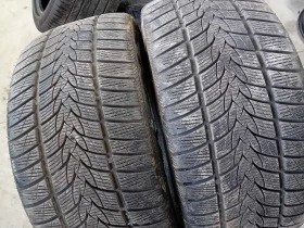 Гуми Зимни 295/35R21, снимка 1