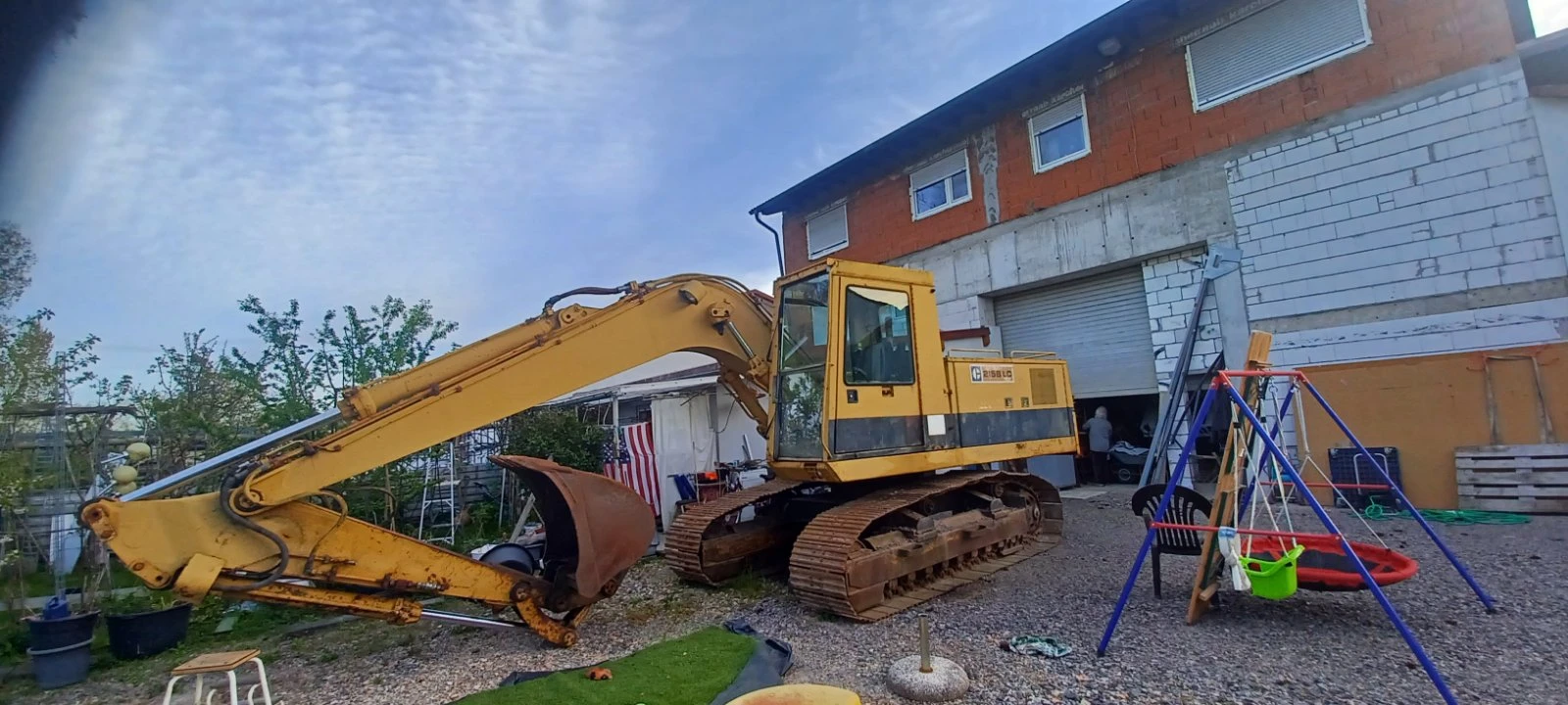 Багер Cat 215BLC