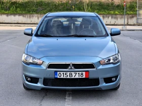 ������ Mitsubishi Lancer