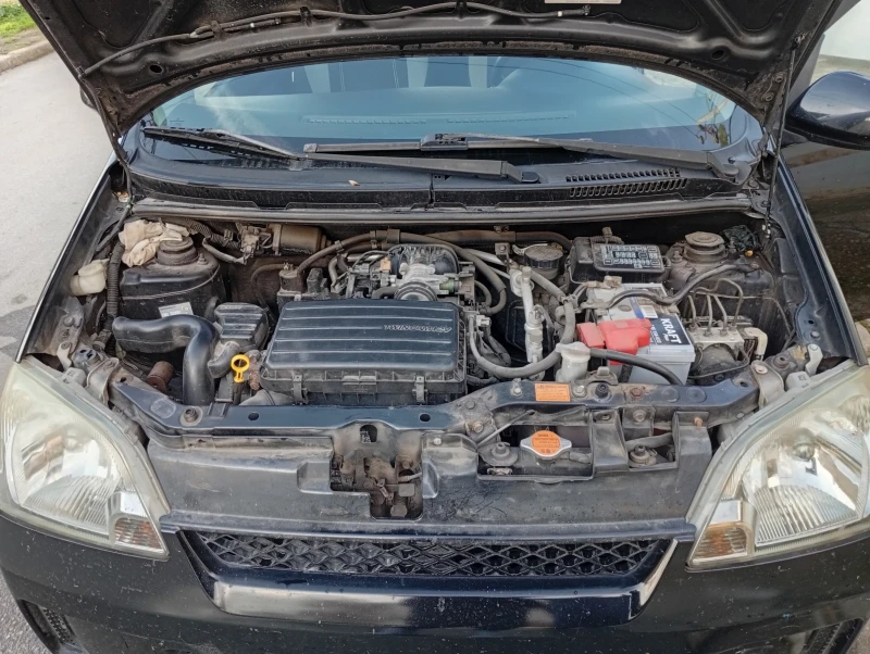 Daihatsu Cuore, снимка 7 - Автомобили и джипове - 52503361