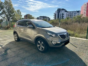 Обява за продажба на Kia Sportage 2.0 CRDI/ 4X4/ NAVI/ CAMERA/ KEYLESS/ CAR PLAY/   ~24 790 лв. - изображение 1