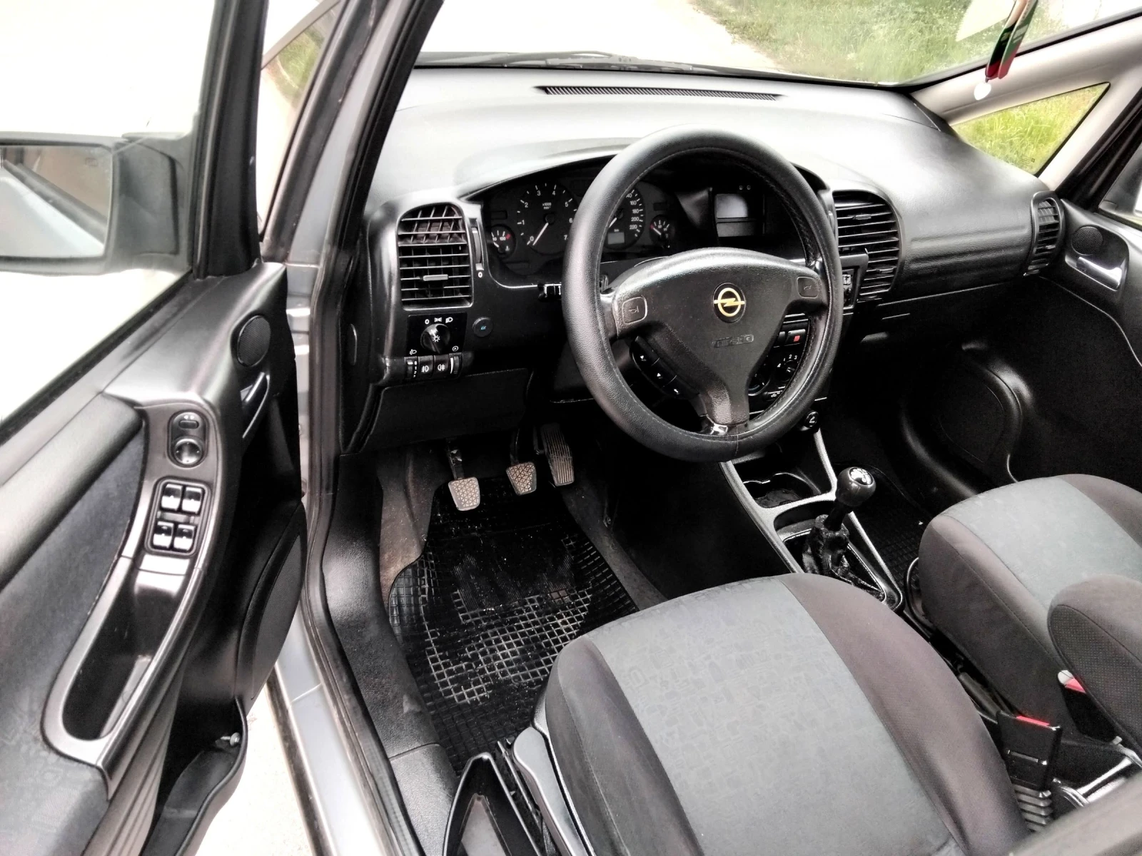 Opel Zafira 1.8i.125k+ КЛИМА.7МЕСТНА+ ГАЗОВ ИНЖЕКЦИОН , снимка 14 - Автомобили и джипове - 54218377