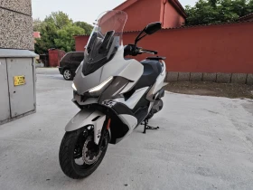 Kymco Xciting VS400, TCS+ ABS - изображение 1