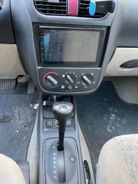 Opel Corsa 1.4 газ, снимка 5