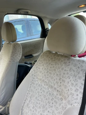 Opel Corsa 1.4 газ, снимка 7