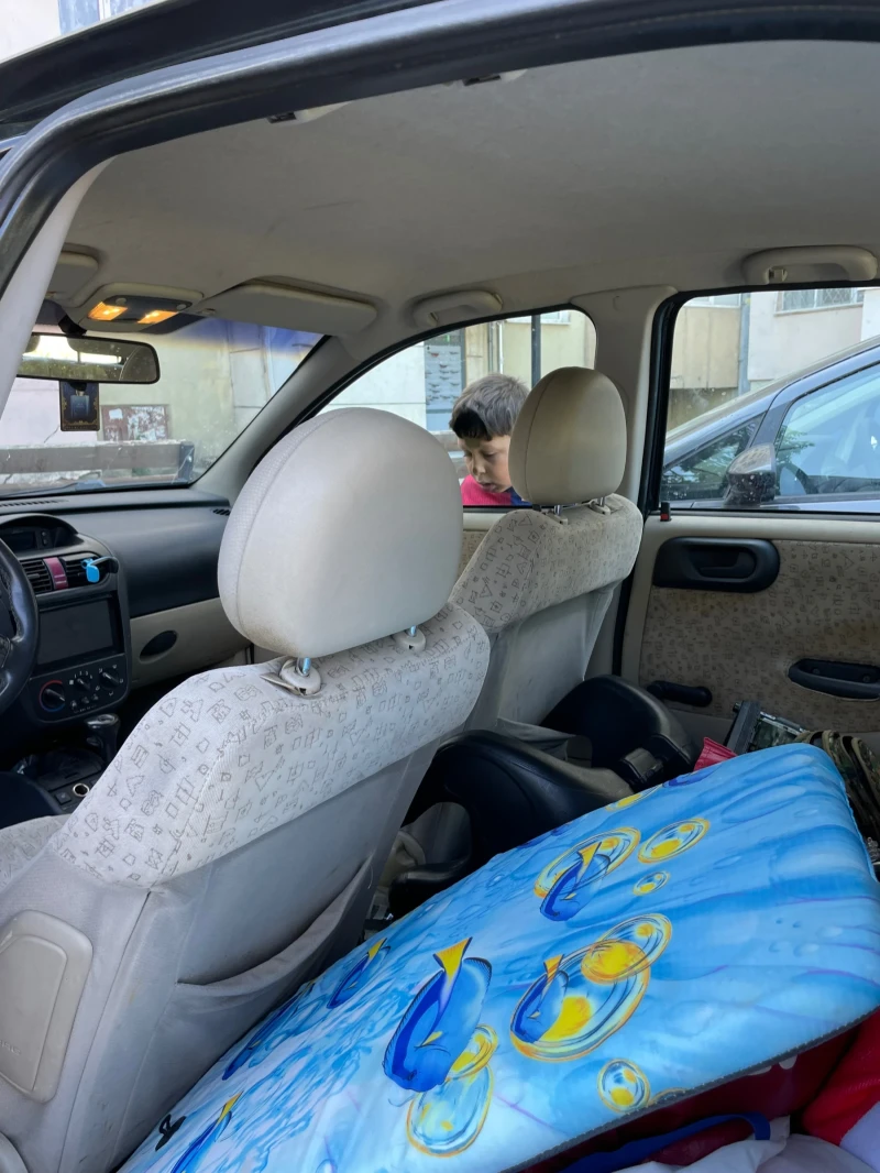 Opel Corsa 1.4 газ, снимка 9 - Автомобили и джипове - 52335873