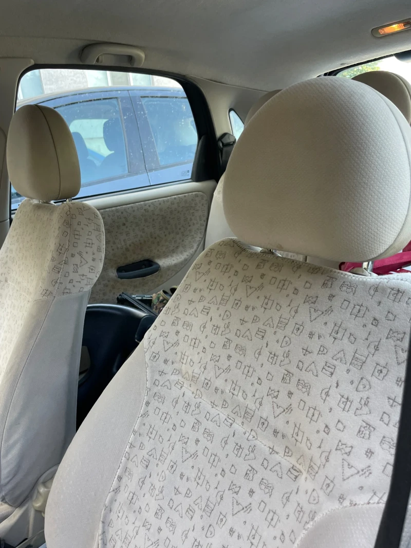 Opel Corsa 1.4 газ, снимка 7 - Автомобили и джипове - 52335873