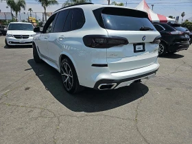 BMW X5 xDrive50i M SPORT LINE* Maсаж* 360* Дистроник* Пан - 63300 лв. - 56926800 | Car24.bg