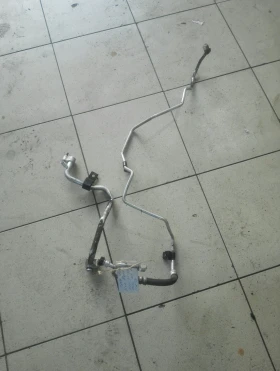 Тръба климатик Киа Каренс 2.0crdi (ляв волан)