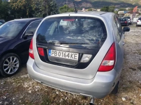 Suzuki Liana Газ 4x4, снимка 3