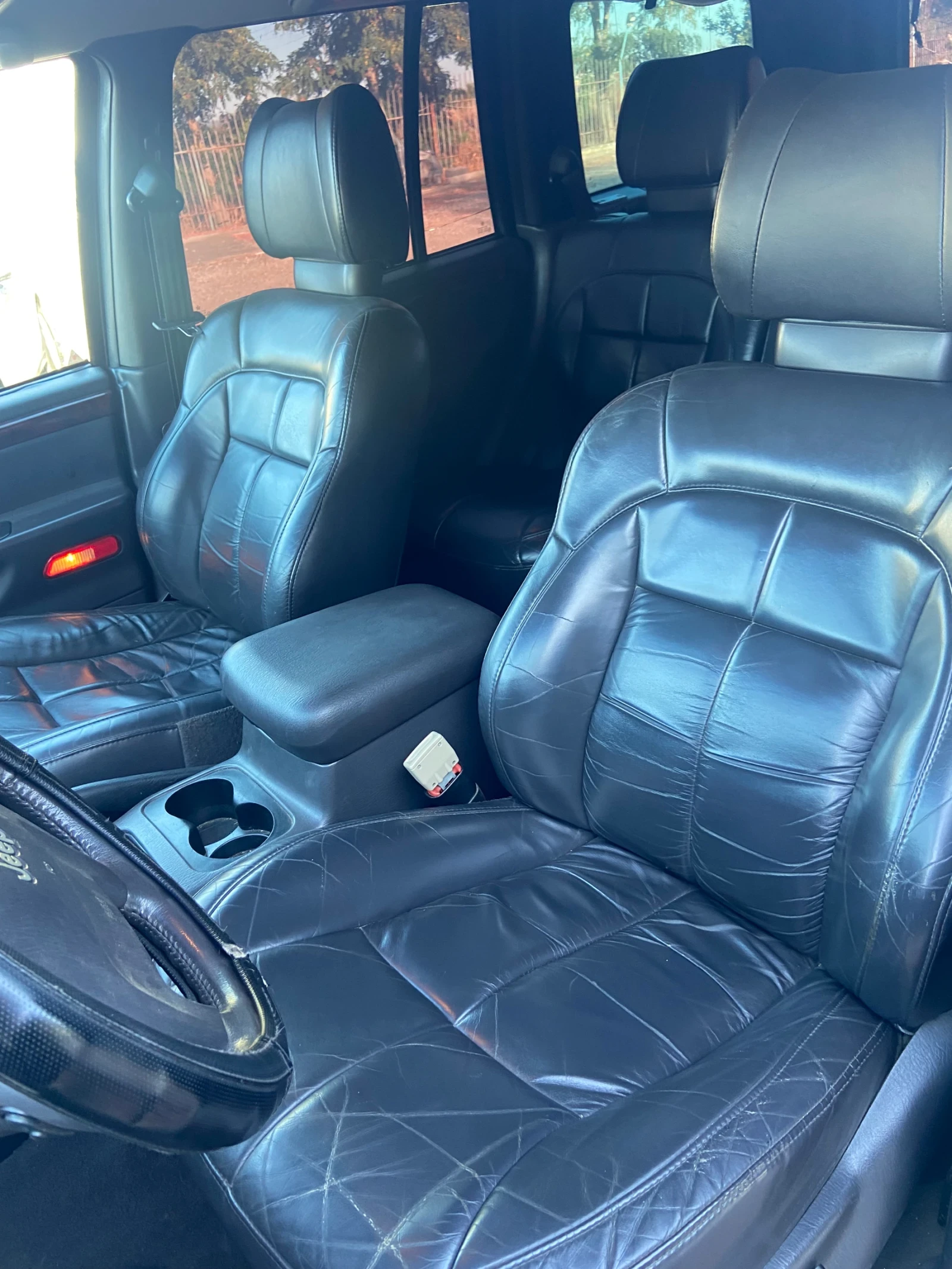 Jeep Grand cherokee 4.7 газ Quadra Drive, снимка 8 - Автомобили и джипове - 55659823