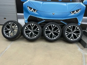 Гуми с джанти Continental 285/45R21, снимка 1