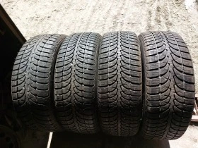 Гуми Зимни 235/60R18, снимка 1 - Гуми и джанти - 45762533