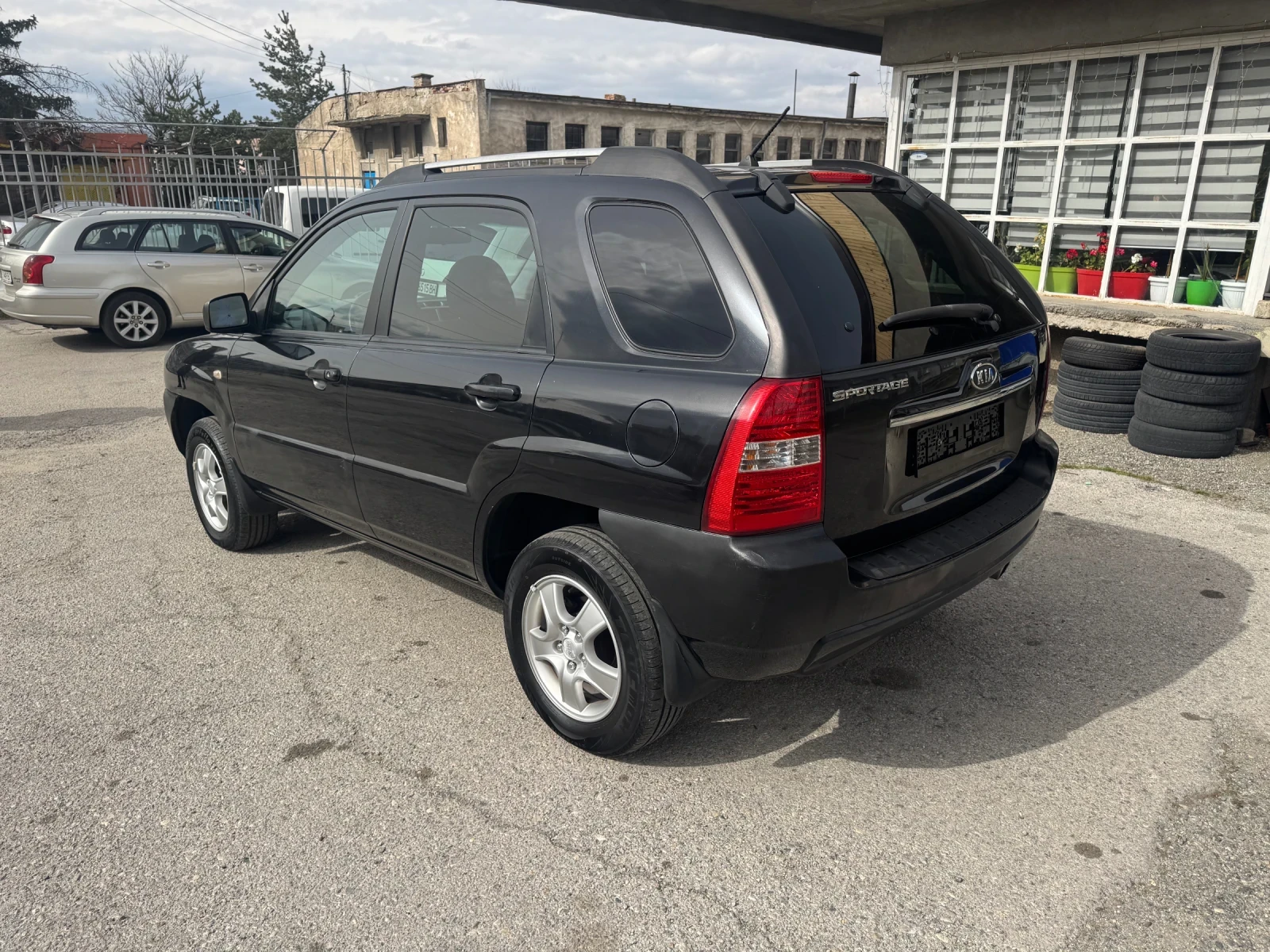 Kia Sportage 2.0i, снимка 3 - Автомобили и джипове - 53905622