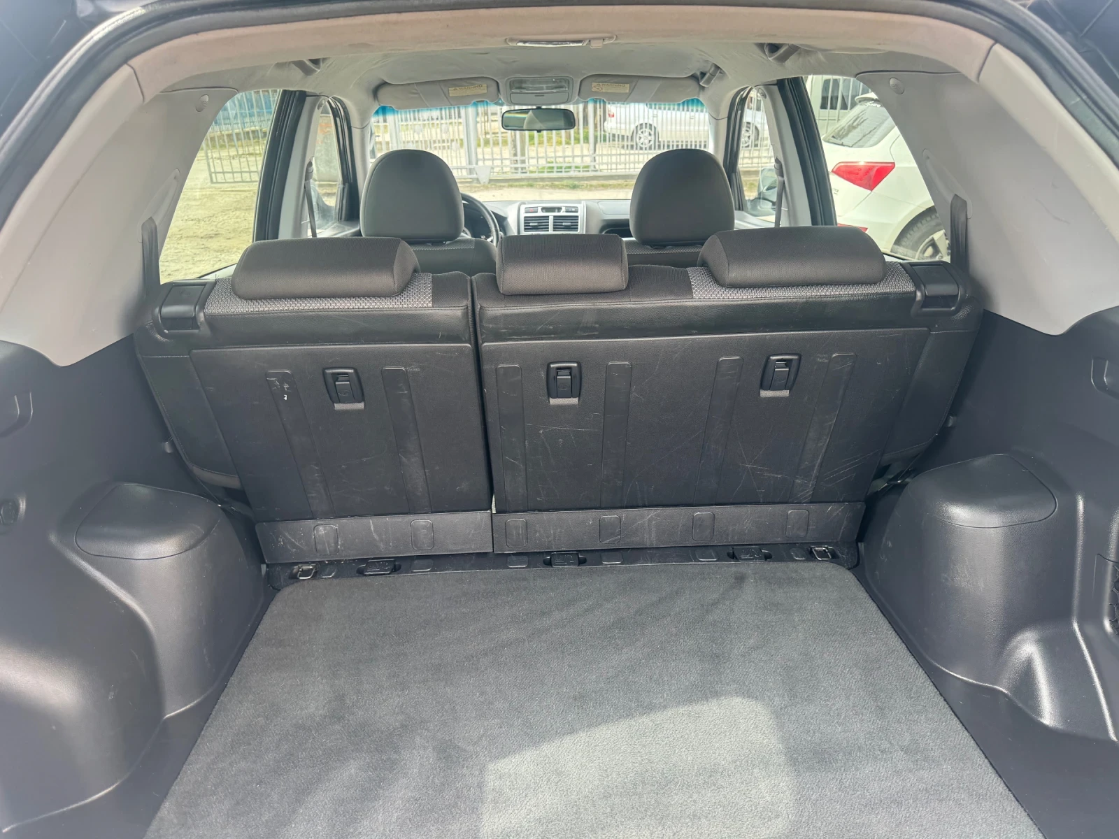 Kia Sportage 2.0i, снимка 13 - Автомобили и джипове - 53905622