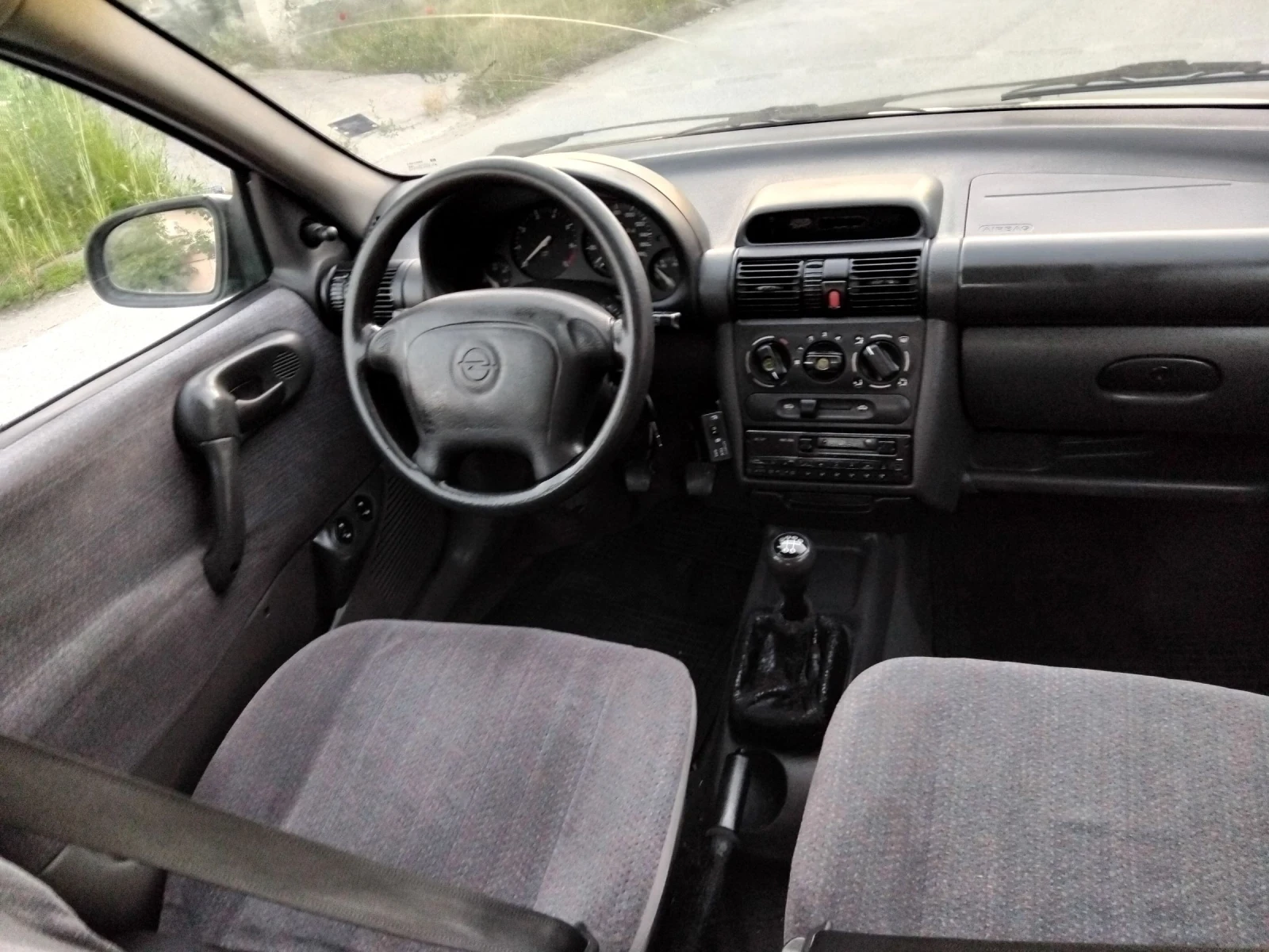 Opel Corsa 1.4.МОНО.75к+ КЛИМА + ГАЗ///, снимка 16 - Автомобили и джипове - 54697310
