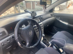 Toyota Corolla E120, снимка 2