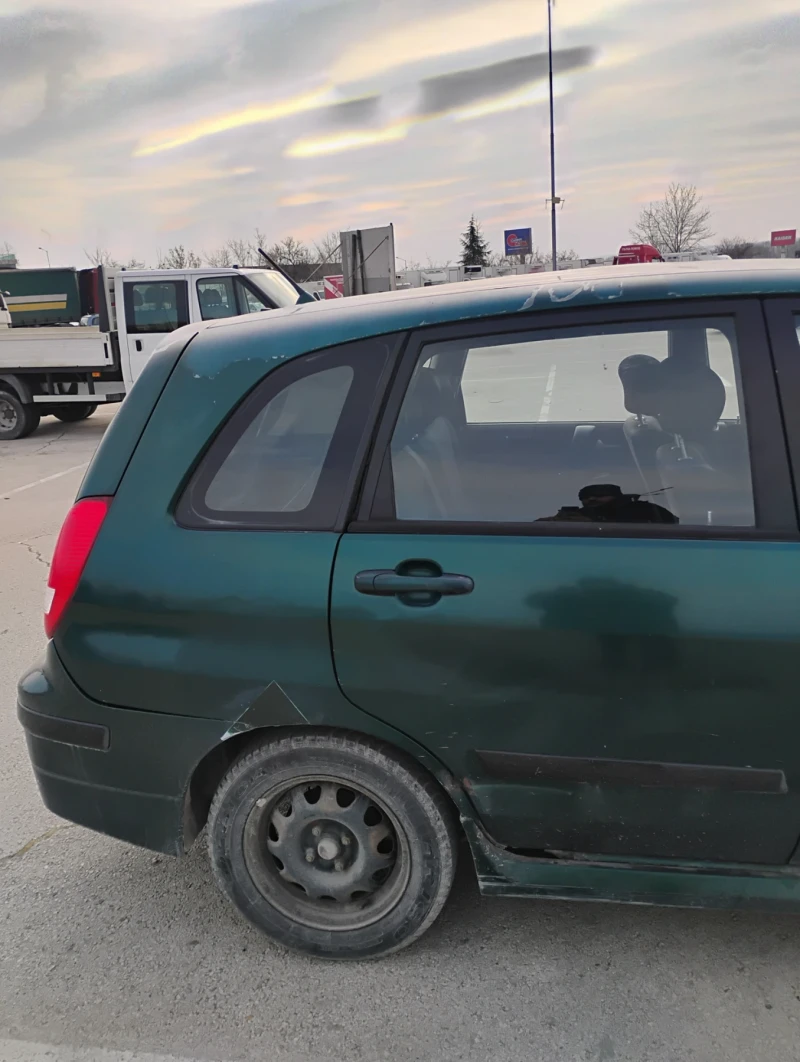 Suzuki Liana 1.3 16V, снимка 4 - Автомобили и джипове - 53152382